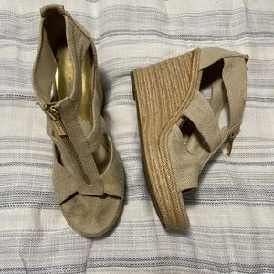 Women’s Micheal Kors Berkeley weave wedges. Used condition. Size 10